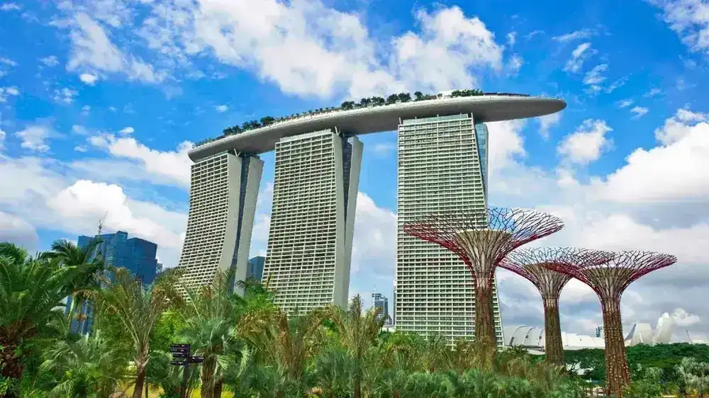 Marina Bay Sands at dusk, architectural ambition reflected in water